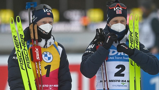 Johannes Thingnes Bö (li.) und Tarjei Bö (Bild: AFPAPA/AFP/Michal Cizek)