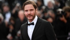 Daniel Brühl (Bild: APA/AFP/LOIC VENANCE)