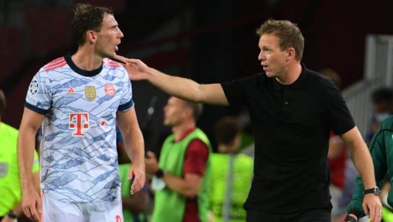 Leon Goretzka (l.) äußert sich zur Trennung von Julian Nagelsmann. (Bild: LLUIS GENE / AFP)