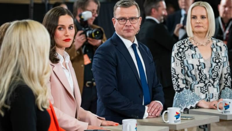 Von links: Die sozialdemokratische Ministerpräsidentin Sanna Marin, Petteri Orpo von den Konservativen und Riikka Purra von der rechtspopulistischen Partei „Die Finnen“ (Bild: AFP)