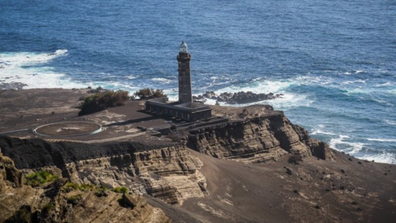 Der Farol da Ponta dos Capelinhos - der ehemalige Leuchtturm- hat dem Vulkanausbruch im Jahr 1957 standgehalten. (Bild: Jakub - stock.adobe.com)