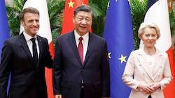 von links: Frankreichs Präsident Emmanuel Macron, Chinas Staatschef Xi Jinping und EU-Kommissionspräsidentin Ursula von der Leyen (Bild: Ludovic Marin/Pool/AP)