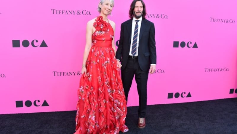 Alexandra Grant und Keanu Reeves (Bild: APA/Alberto E. Rodriguez/Getty Images/AFP)