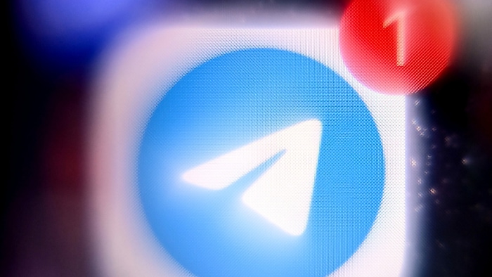 This photo taken on March 23, 2022 shows the mobile messaging and call service Telegram logo on ...