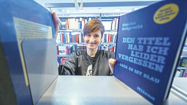 Bibliothekarin Monika Reitprecht lockt via Social Media in die Bücherei. (Bild: PID / Bubu Dujmic)