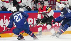 Henrik Neubauer (M.) glänzt bei der WM auch fürs heimische Team. (Bild: Pavel Golovkin)