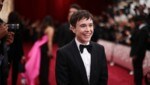 Elliot Page strahlt förmlich bei seinem Auftritt auf dem roten Teppich. (Bild: APA/Getty Images via AFP/GETTY IMAGES/Emma McIntyre)