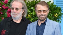 Bjorn Ulvaeus und Benny Andersson von ABBA (Bild: APA/AFP/Anthony HARVEY)