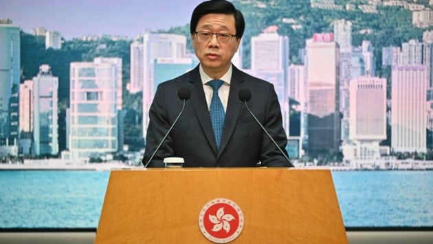Hongkongs Regierungschef John Lee kritisiert die Veröffentlichung der Mordszenen. (Bild: AFP)