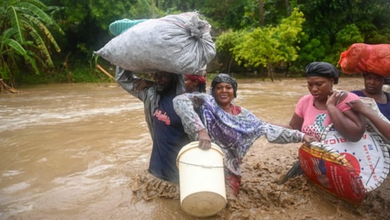 Schwere Regenfälle haben in Haiti Überschwemmungen und Erdrutsche ausgelöst, (Bild: AFP)