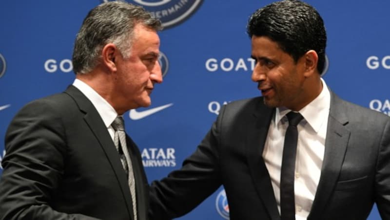 Trainer Christophe Galtier (li.) und PSG-Präsident Nasser Al-Khelaifi (Bild: APA/AFP/BERTRAND GUAY)