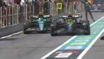 Lewis Hamilton (re.) und Fernando Alonso kamen sich in der Boxengasse gefährlich nahe. (Bild: ServusTV (Screenshot))