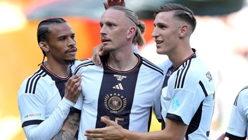 Leroy Sane, Marius Wolf und Nico Schlotterbeck (von li. nach re.) (Bild: AP)