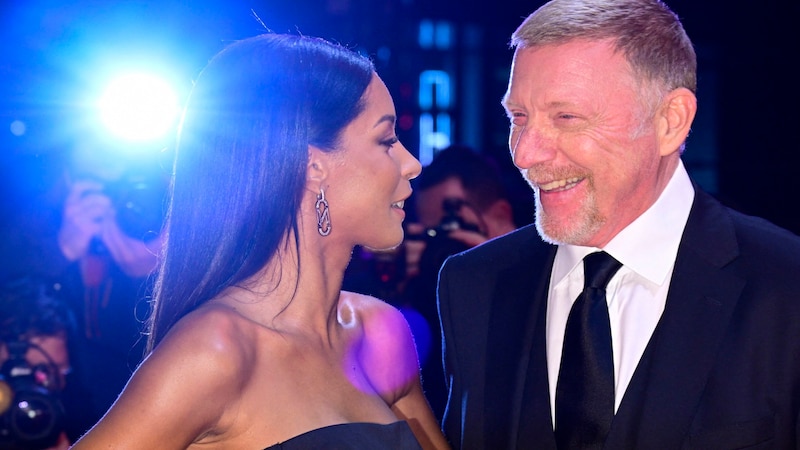 Lilian de Carvalho Monteiro mit Boris Becker (Bild: APA/AFP/John MACDOUGALL)