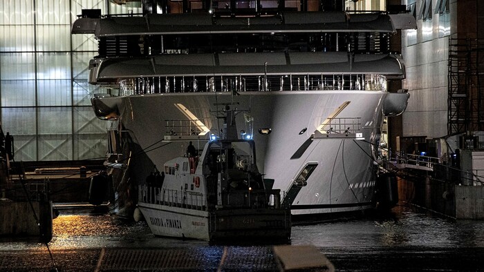 A boat of the Italian financial police at Scheherazade after its seizure in May 2022