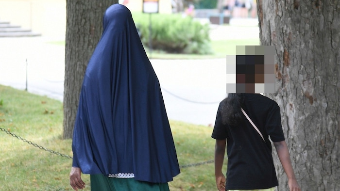 Migrantin mit Kind