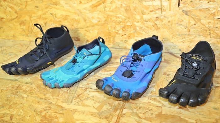 To maintain the barefoot feeling while protecting the feet from injury, he designed shoes with individual chambers for each toe.