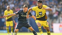 Kevin Stöger (l.) traf zum 1:0. (Bild: APA/AFP/INA FASSBENDER)