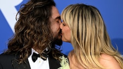 Tom Kaulitz und Heidi Klum bekamen im Liebes-Urlaub auf St. Barth ein schlüpfriges Angebot. (Bild: APA/AFP/Stefano Rellandini)