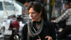 Eine Frau im Iran, die sich nicht an die dortige Kopftuchpflicht hält (Bild: AP)