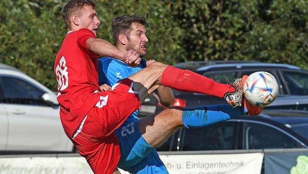 Wietersdorfs Novak (re., gegen Kienzl) sorgte mit dem 2:1 für die Entscheidung im Hit in St. Paul. (Bild: Sobe Hermann)