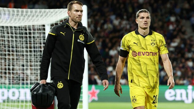 Dortmunds Marcel Sabitzer musste in der 12. Spielminute gegen Paris St. Germain verletzt ausgewechselt werden. (Bild: APA/AFP/FRANCK FIFE)