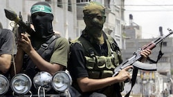Kämpfer der Terrororganisation Hamas (Bild: AP)