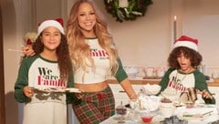 Mariah Carey posiert mit ihren Zwillingen für eine Weihnachtskampagne. (Bild: The Children’s Place via PR Newswire)