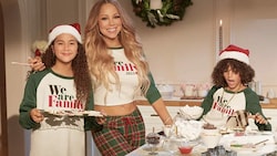 Mariah Carey posiert mit ihren Zwillingen für eine Weihnachtskampagne. (Bild: The Children’s Place via PR Newswire)