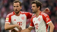 Harry Kane (li.) und Thomas Müller schrieben sich auf die Torschützenliste gegen Darmstadt. (Bild: APA/AFP/Christof STACHE)