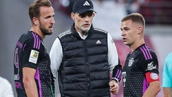 Finden Harry Kane, Thomas Tuchel und Joshua Kimmich (von li. nach re.) in Dortmund in die Erfolgsspur zurück? (Bild: APA/AFP/Ronny Hartmann)
