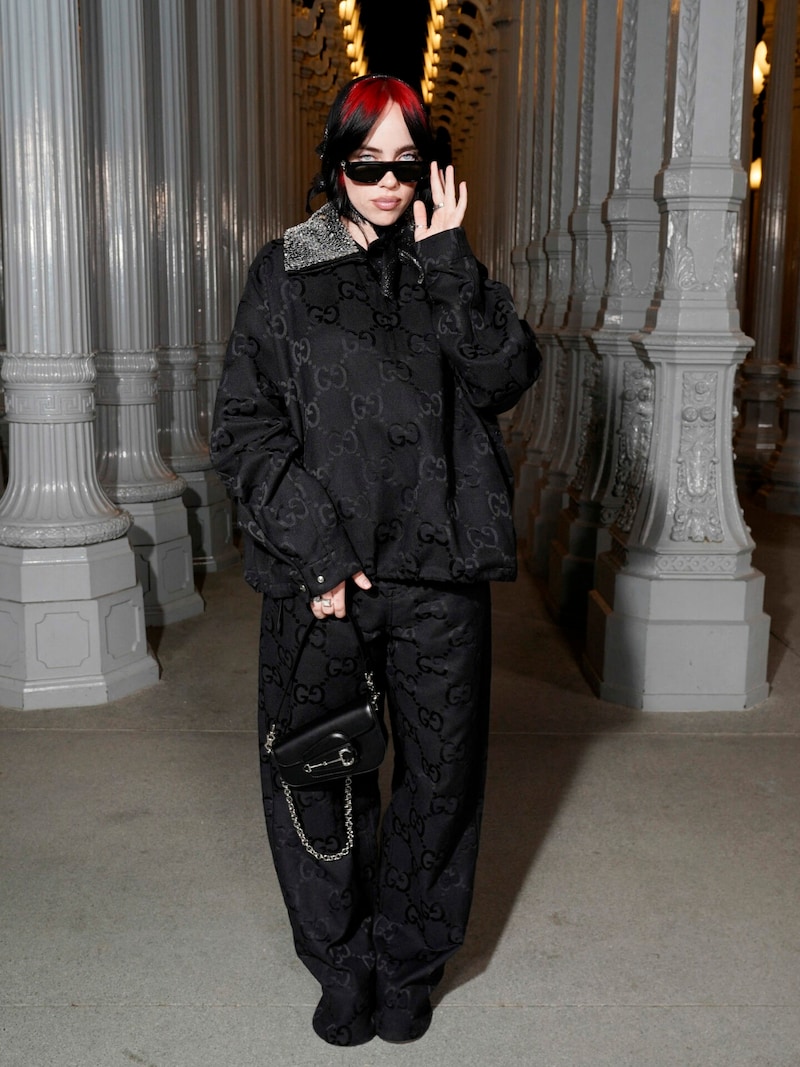 Gucci-Testimonial Billie Eilish blieb mit diesem Outfit ihrem Stil treu. (Bild: APA/Getty Images via AFP/GETTY IMAGES/Presley Ann)