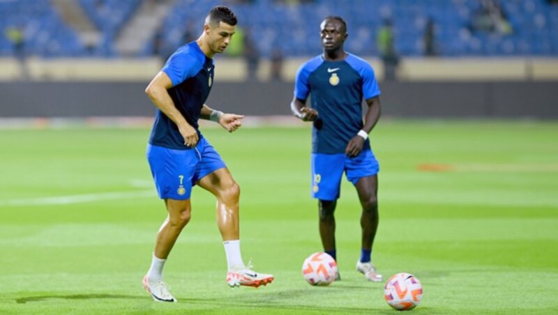 Bekommen Cristiano Ronaldo (l.) und Sadio Mane bald Unterstützung aus Belgien? (Bild: APA/AFP/Ali Al-HAJI, Photoshop)