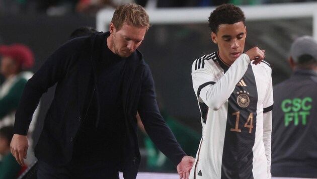 Julian Nagelsmann (l.) und Jamal Musiala (Bild: AFP/GETTY IMAGES/ALEX GRIMM)