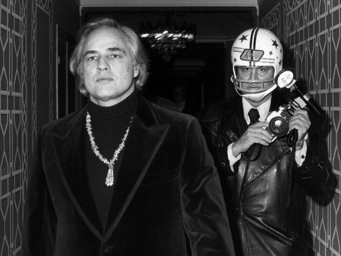 Paul Schmulbach: Marlon Brando & Ron Galella Waldorf Hotel, New York 1974