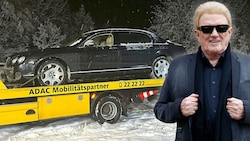 Heinos Luxus-Auto hatte im wilden Schneechaos einen Reifenplatzer und musste abgeschleppt werden. (Bild: Anita Bugge / Action Press / picturedesk.com Benedict Bartsch, Krone KREATIV)