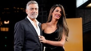 Amal Clooney an der Seite ihres Ehemannes George Clooney (Bild: AP/Alberto Pezzali/Invision)