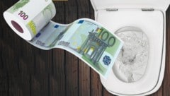 Von den größten Städten in Niederösterreich liegt nur eine bei den Kosten für WC-Spülungen unter dem Bundesschnitt von 9,83 Euro. (Bild: WinNondakowit-stock.adobe.com, Krone KREATIV)