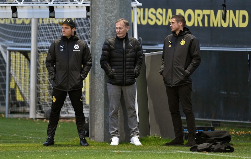 Die drei Gesichter des Dortmunder Machtkampfs: Edin Terzic (links), Hans-Joachim-Watzke (mitte) und Sebastian Kehl. (Bild: APA/AFP/Ina FASSBENDER)