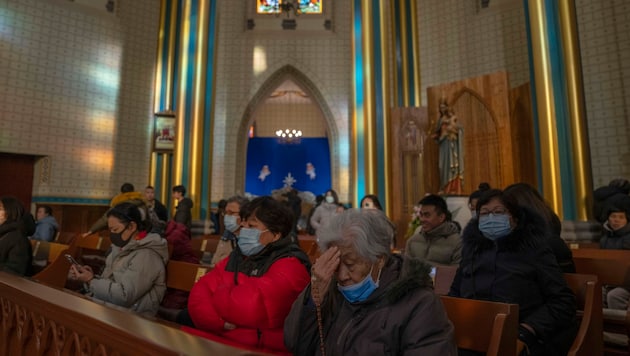 Katholischer Gottesdienst am Montag in Peking (Bild: AP)