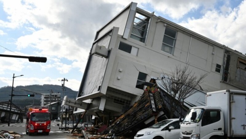 Ein einstürzendes Haus (Bild: AFP)