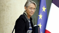 Präsident Emmanuel Macron will sein Kabinett umbauen, Premierministerin Elisabeth Borne muss gehen. (Bild: APA/AFP/Ludovic MARIN)