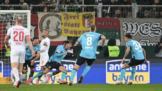 Großer Jubel bei Leverkusen. (Bild: APA/AFP/LUKAS BARTH)