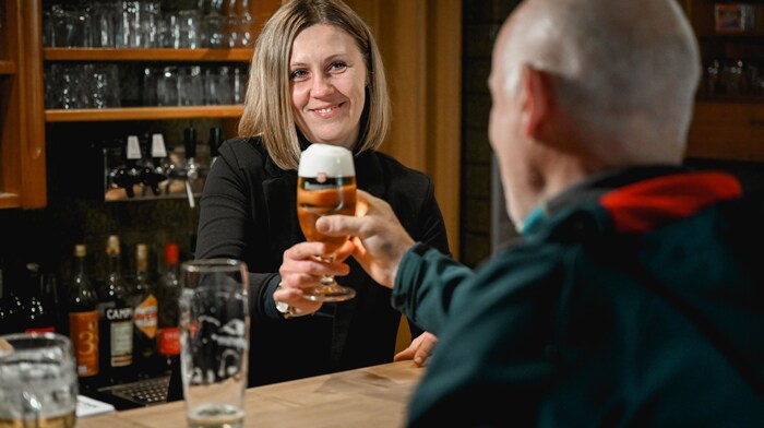 Cheers! No cell phones in the pub.