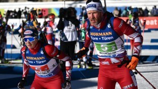 Simon Eder und Lisa Hauser (Bild: APA/AFP/Marco BERTORELLO)