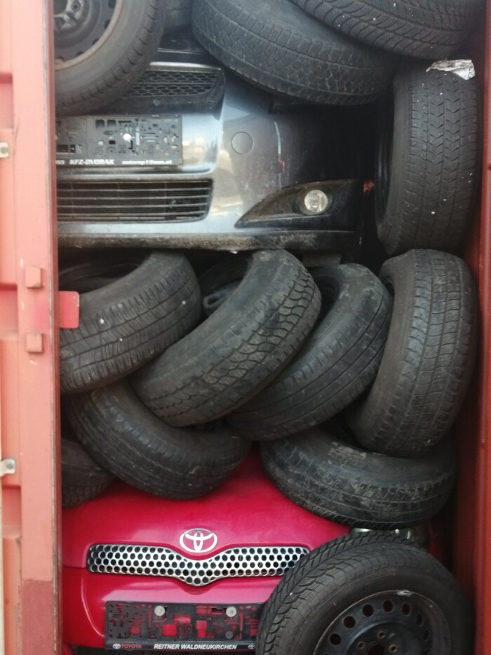 The large load of car wrecks and tires for Cameroon