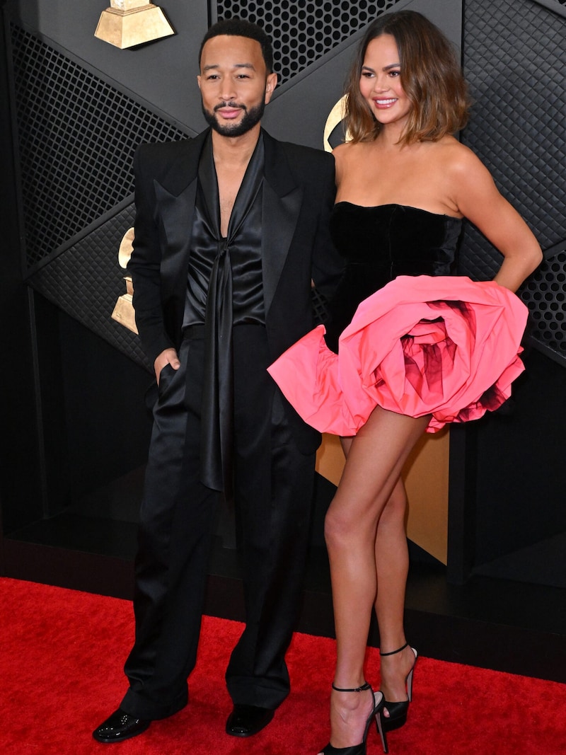 John Legend und Chrissy Teigen in Sophie Couture (Bild: APA/AFP/Robyn BECK)