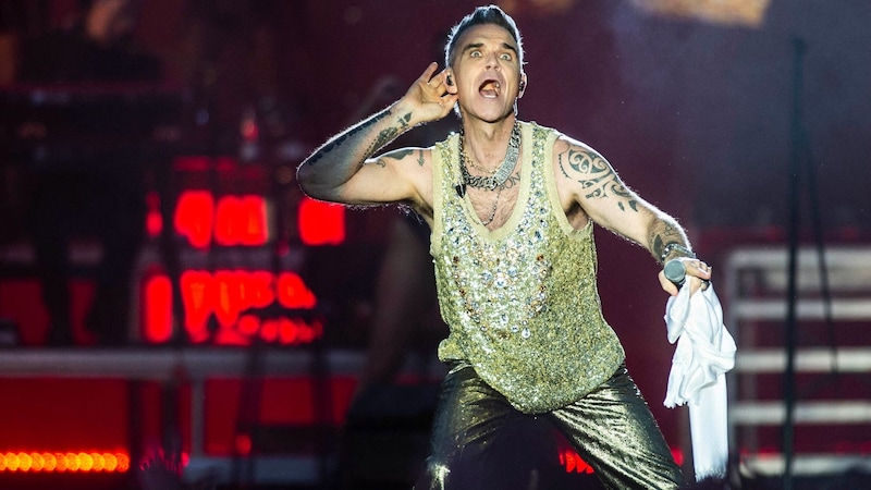 Robbie Williams wird 50 (Bild: TIM KILDEBORG JENSEN / AFP / picturedesk.com)