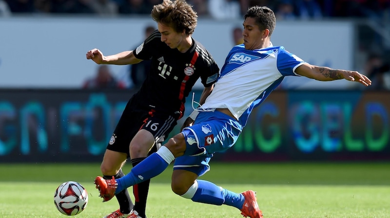 Gaudino im Duell mit Roberto Firmino (Bild: Matthias Hangst)