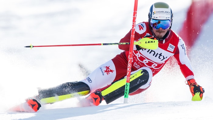 Manuel Feller carves his way towards the slalom crystal.